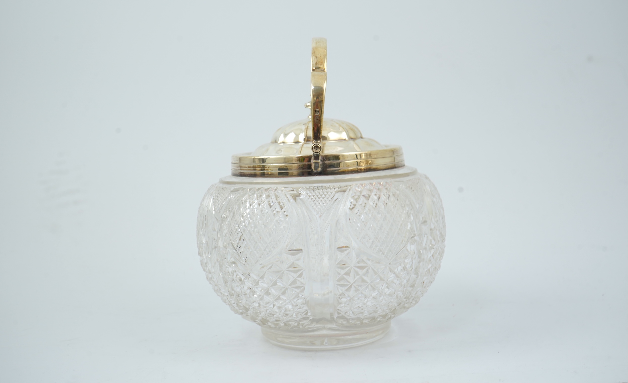 A late Victorian silver mounted cut glass biscuit barrel, by Atkin Brothers